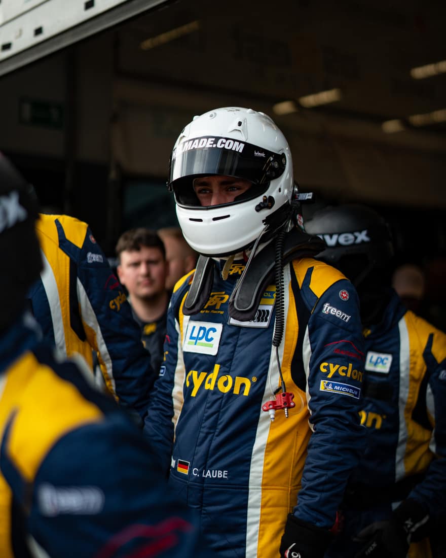 Portrait of a Smyrlis Racing driver with helmet